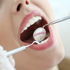 Patient receiving dental exam