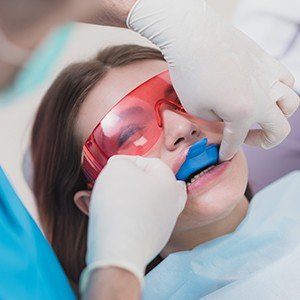 Patient receiving fluoride treatment