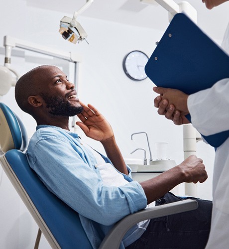 Man talking to the dentist