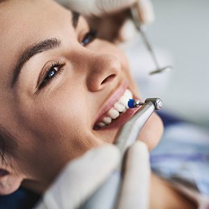 Woman having her teeth cleaned