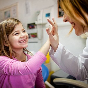 Child receiving dental exam