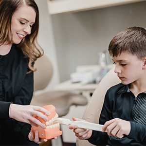 Smilling little boy in dental chair