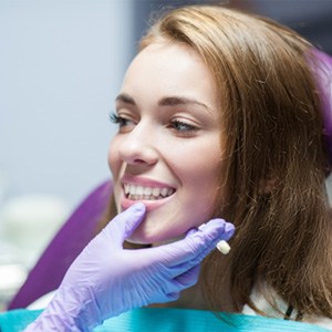 A woman being assessed for dental crowns
