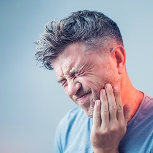 dentist showing a patient their dental X rays