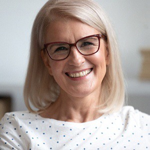 smiling woman with glasses