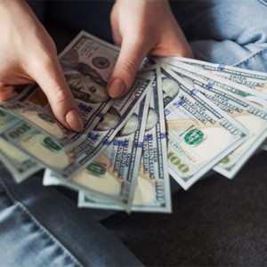 Woman counting cash